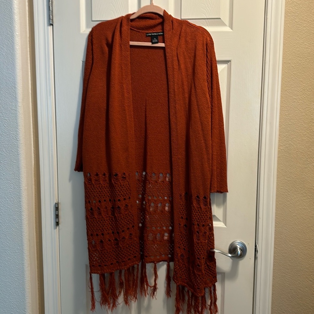Cardigan. Super soft. She’s beautiful